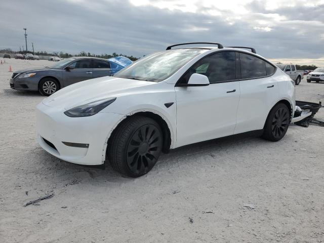 TESLA MODEL Y 2024 with VIN 7SAYGDEF5RF048999 - Photo from auction