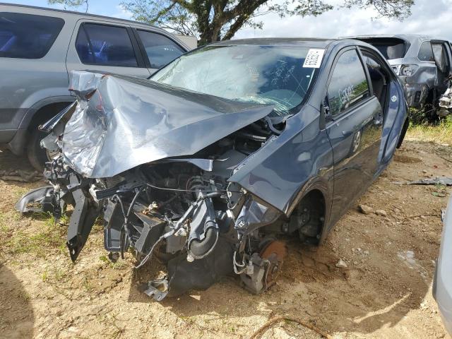 TOYOTA COROLLA 2017 with VIN 5YFBURHE9HP595112 - Photo from auction