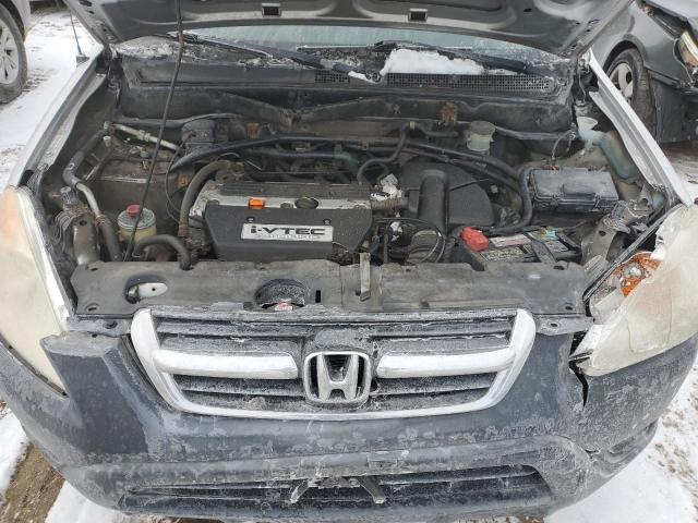 Photo 11 from auction – 2004 HONDA CR-V LX with VIN JHLRD68574C013432