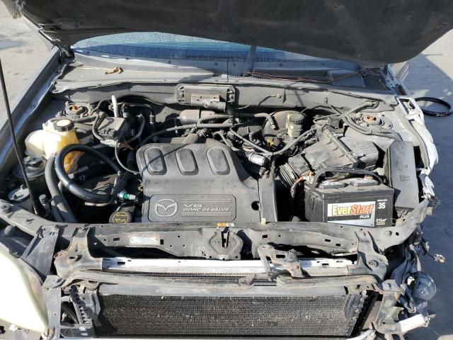 Photo 11 from auction – 2004 MAZDA TRIBUTE LX with VIN 4F2YZ04114KM28035