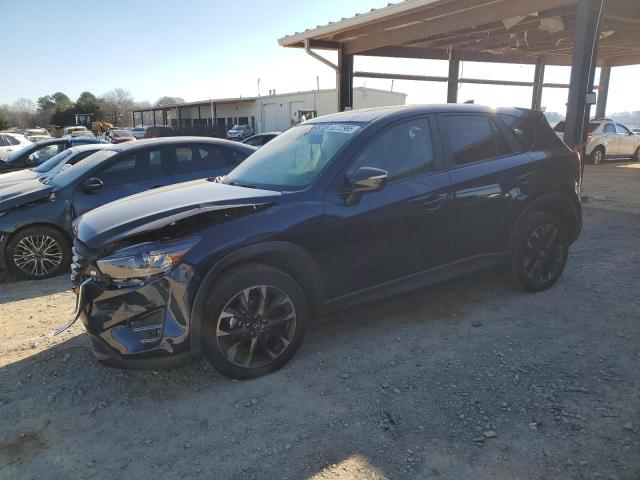 MAZDA CX-5 GT 2016 with VIN JM3KE4DY4G0810847 - Photo from auction