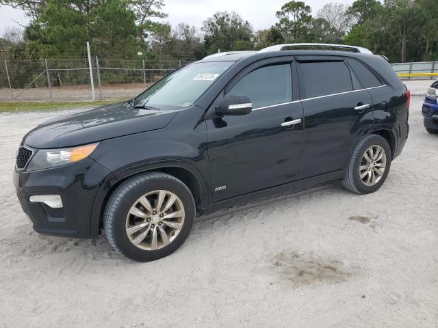 KIA SORENTO SX 2013 with VIN 5XYKWDA29DG374878 - Photo from auction