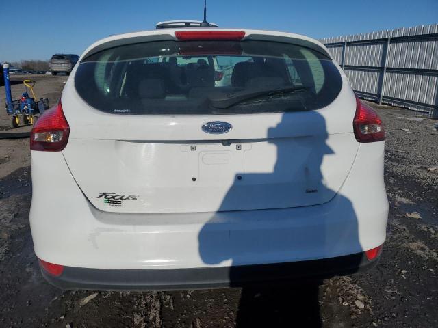 Foto 6 de la subasta – 2017 FORD FOCUS SE con VIN 1FADP3K20HL278765