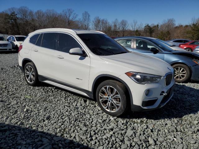 Photo 4 from auction – 2017 BMW X1 XDRIVE2 with VIN WBXHT3Z33H4A65718