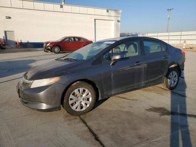 HONDA CIVIC LX 2012 with VIN 2HGFB2F5XCH577266 - Photo from auction