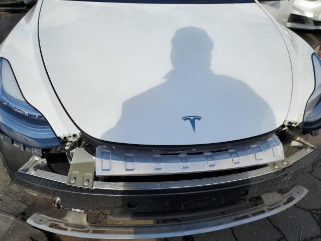Photo 11 from auction – 2021 TESLA MODEL Y with VIN 5YJYGDEE4MF297226