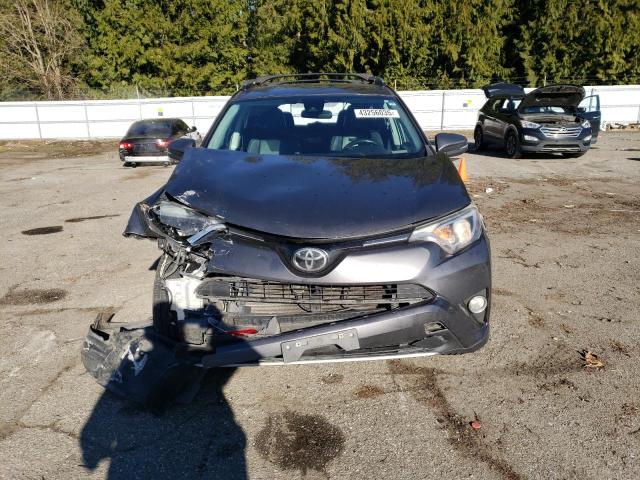 Photo 5 from auction – 2017 TOYOTA RAV4 XLE with VIN 2T3RFREV7HW576092