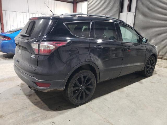 Photo 3 from auction – 2017 FORD ESCAPE SE with VIN 1FMCU9GD1HUC63273