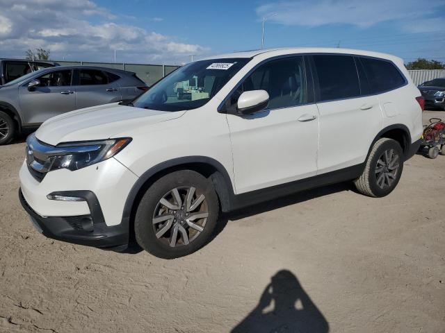 HONDA PILOT EXL 2021 with VIN 5FNYF6H52MB058607 - Photo from auction