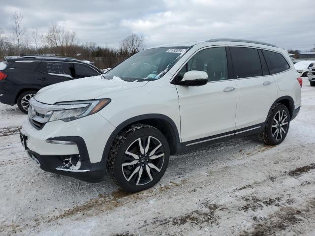 HONDA PILOT TOUR 2020 with VIN 5FNYF6H99LB022124 - Photo from auction