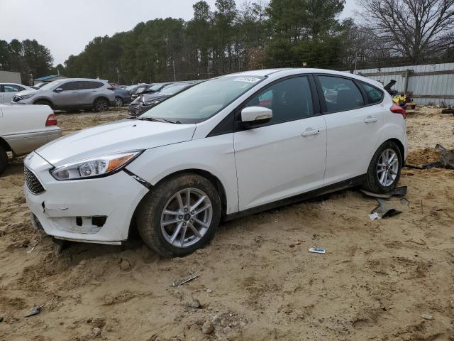 FORD FOCUS SE 2016 with VIN 1FADP3K27GL338846 - Photo from auction