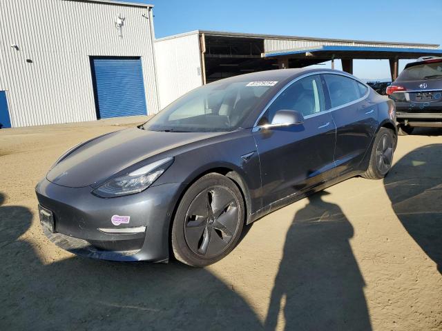 TESLA MODEL 3 2018 with VIN 5YJ3E1EB2JF084789 - Photo from auction