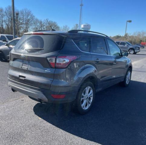 Photo 3 from auction – 2018 FORD ESCAPE SE with VIN 1FMCU0GD7JUB61798