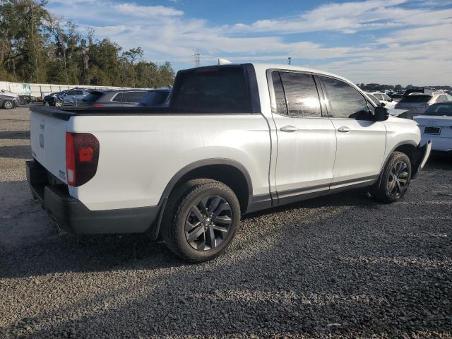 Photo 3 from auction – 2021 HONDA RIDGELINE with VIN 5FPYK3F10MB019922