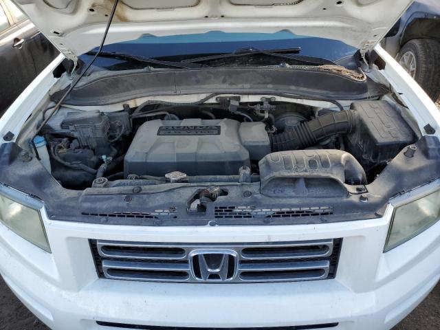 Photo 11 from auction – 2007 HONDA RIDGELINE with VIN 2HJYK16217H537358