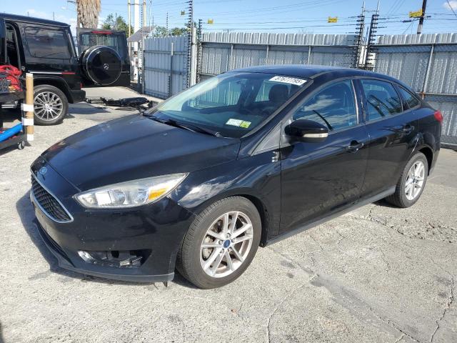 FORD FOCUS SE 2016 with VIN 1FADP3F22GL354236 - Photo from auction