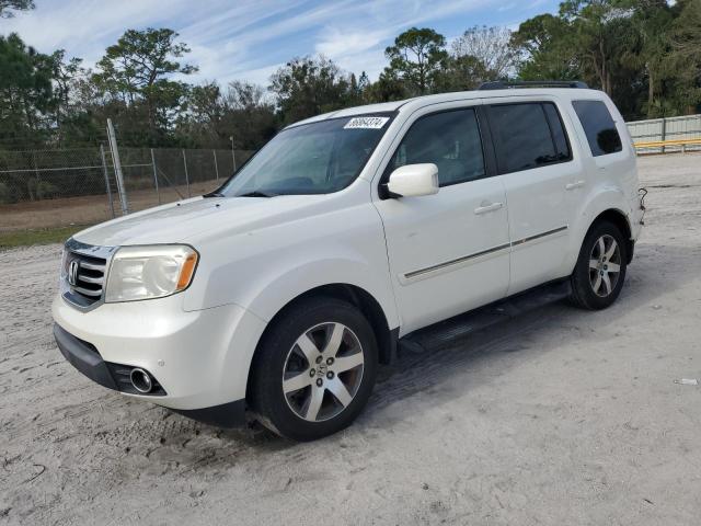 HONDA PILOT TOUR 2012 with VIN 5FNYF4H96CB084620 - Photo from auction