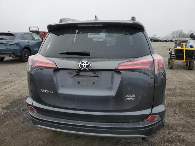 Photo 6 from auction – 2017 TOYOTA RAV4 XLE with VIN JTMRFREV5HD219359