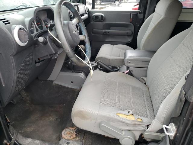 Photo 7 from auction – 2009 JEEP WRANGLER S with VIN 1J4FA54109L702963