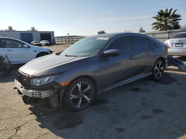 HONDA CIVIC LX 2017 with VIN 2HGFC2F5XHH509988 - Photo from auction