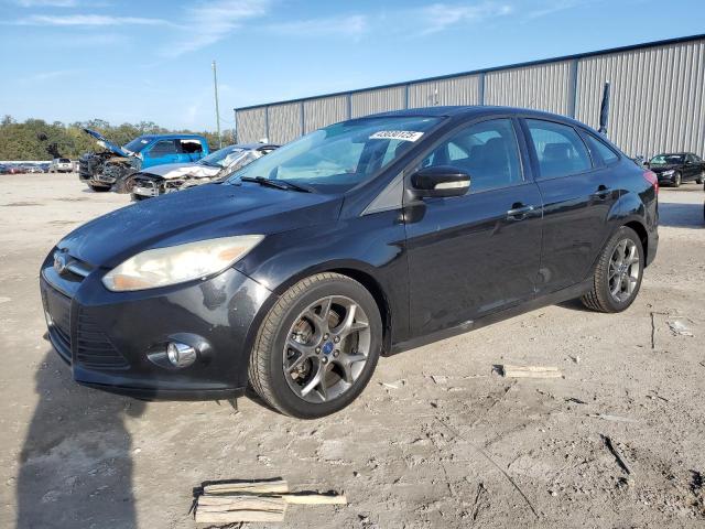 FORD FOCUS SE 2014 with VIN 1FADP3F2XEL405561 - Photo from auction