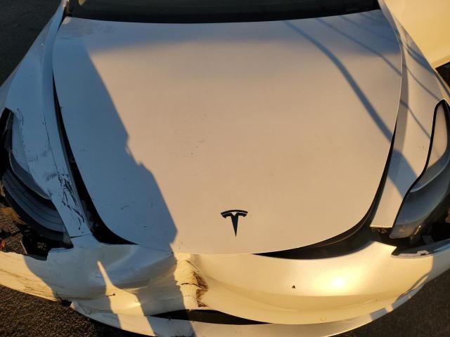 Photo 11 from auction – 2022 TESLA MODEL 3 with VIN 5YJ3E1EB3NF238271