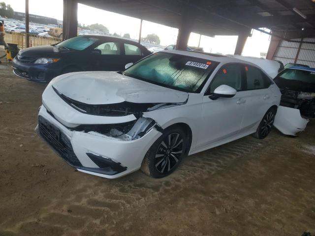 HONDA CIVIC EX 2023 with VIN 2HGFE1F77PH315990 - Photo from auction
