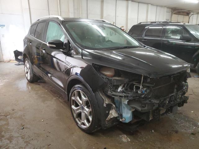 Photo 4 from auction – 2017 FORD ESCAPE TIT with VIN 1FMCU0J93HUA48784