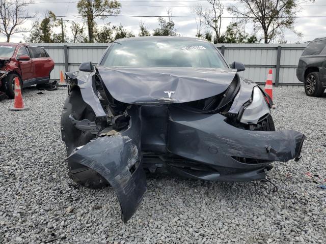 Photo 5 from auction – 2023 TESLA MODEL 3 with VIN 5YJ3E1EB3PF665162