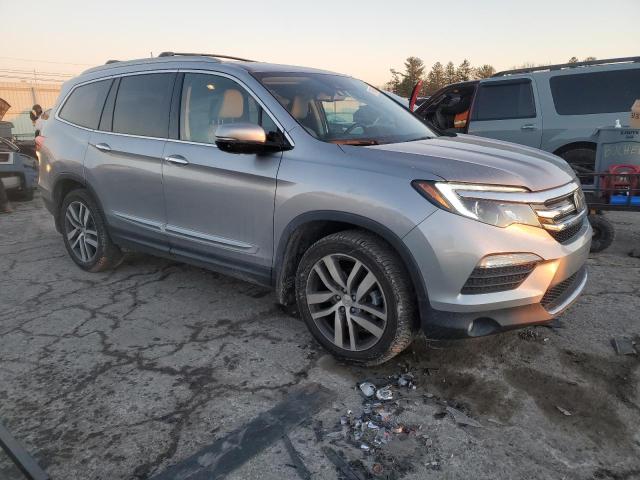 Photo 4 from auction – 2017 HONDA PILOT ELIT with VIN 5FNYF6H02HB055667