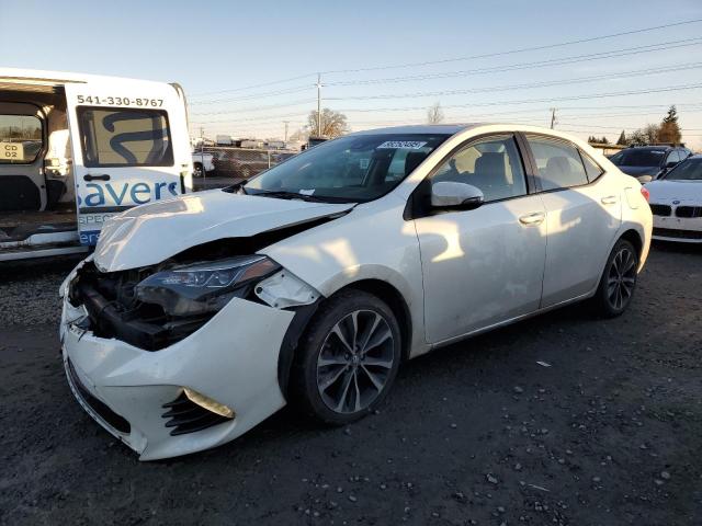TOYOTA COROLLA L 2017 with VIN 5YFBURHE5HP645861 - Photo from auction