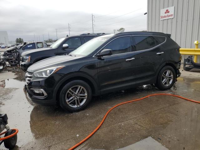 HYUNDAI SANTA FE S 2017 with VIN 5NMZU3LB9HH013528 - Photo from auction
