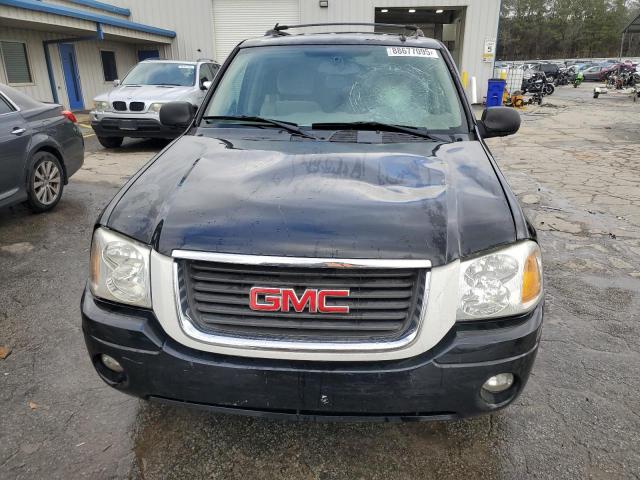 Photo 5 from auction – 2006 GMC ENVOY with VIN 1GKDS13S762258032