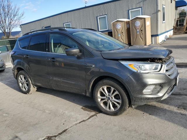 Photo 4 from auction – 2017 FORD ESCAPE SE with VIN 1FMCU9GD4HUD14541