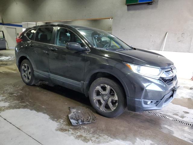 Photo 4 from auction – 2018 HONDA CR-V EXL with VIN 7FARW2H87JE097474