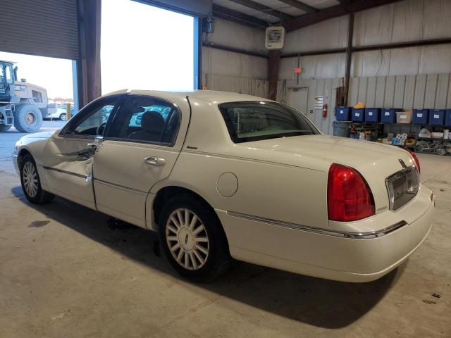 Photo 2 from auction – 2003 LINCOLN TOWN CAR E with VIN 1LNHM81W23Y696905