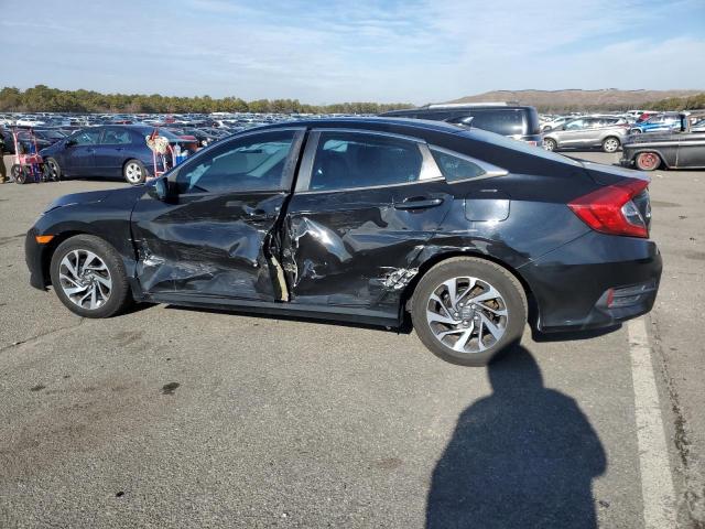 Photo 2 from auction – 2017 HONDA CIVIC EX with VIN 2HGFC2F76HH576640