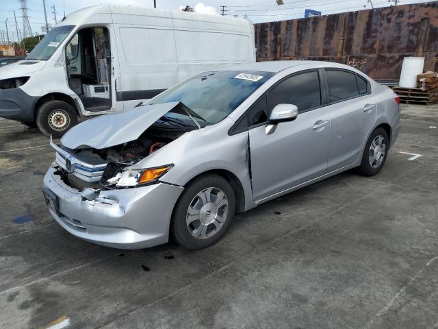HONDA CIVIC HYBR 2012 with VIN JHMFB4F26CS000869 - Photo from auction