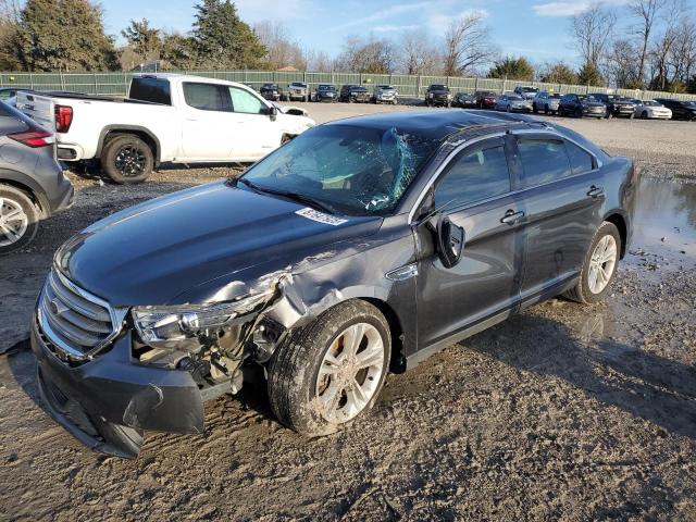 FORD TAURUS SE 2015 with VIN 1FAHP2D83FG198976 - Photo from auction