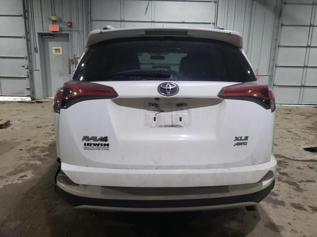 Photo 6 from auction – 2016 TOYOTA RAV4 XLE with VIN 2T3RFREV8GW503425