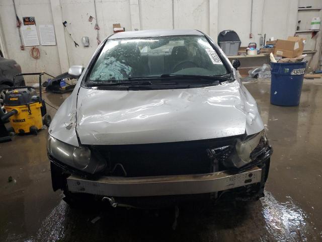 Photo 5 from auction – 2011 HONDA CIVIC LX with VIN 19XFA1F55BE037555