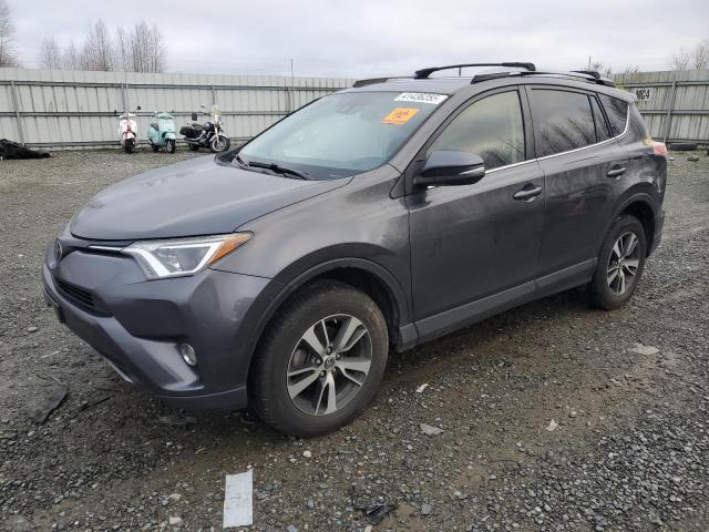 Photo 1 from auction – 2017 TOYOTA RAV4 XLE with VIN JTMRFREV8HJ119127