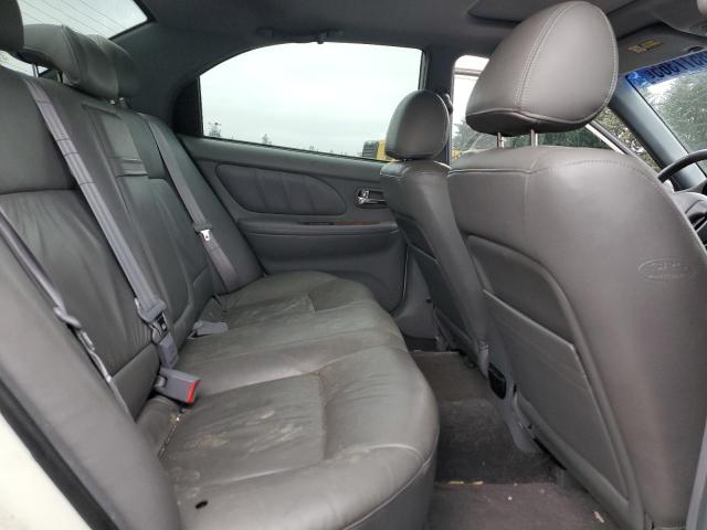 Photo 10 from auction – 2002 KIA OPTIMA MAG with VIN KNAGD128025109590