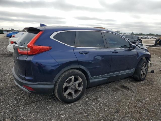 Photo 3 from auction – 2017 HONDA CR-V with VIN 5J6RW1H89HL009788