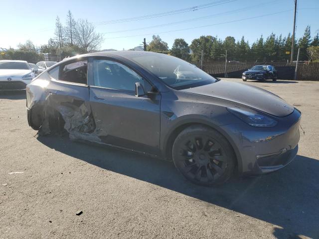 Photo 4 from auction – 2023 TESLA MODEL Y with VIN 7SAYGDEE3PF980879