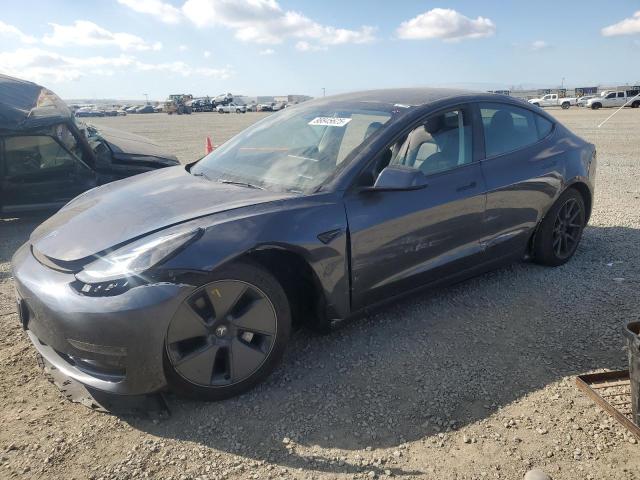 TESLA MODEL 3 2023 with VIN 5YJ3E1EAXPF664484 - Photo from auction