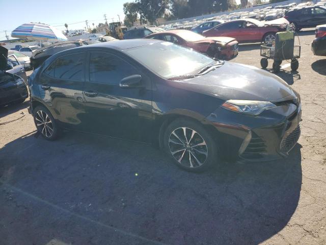 Photo 4 from auction – 2017 TOYOTA COROLLA L with VIN 5YFBURHE4HP608283