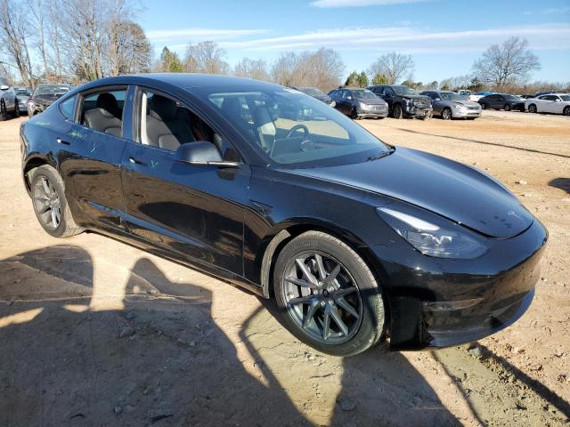Снимка 4 от търг – 2022 TESLA MODEL 3 с VIN 5YJ3E1EB5NF345774