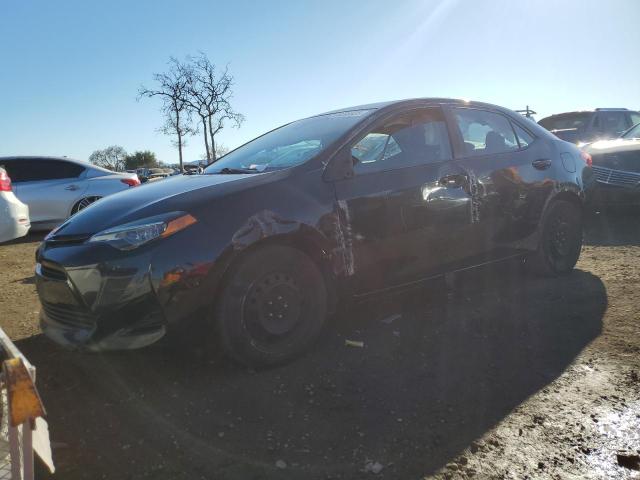 TOYOTA COROLLA L 2018 with VIN 5YFBURHE8JP825986 - Photo from auction