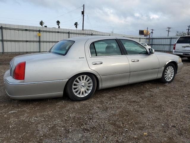 Photo 3 from auction – 2004 LINCOLN TOWN CAR E with VIN 1LNHM81WX4Y671249